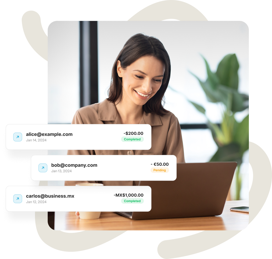 Picture of a woman looking satisified while looking at her laptop